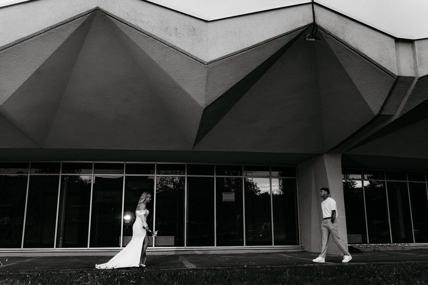 A series of architectural photos showing angular geometric roof lines and modern building designs in black and white.