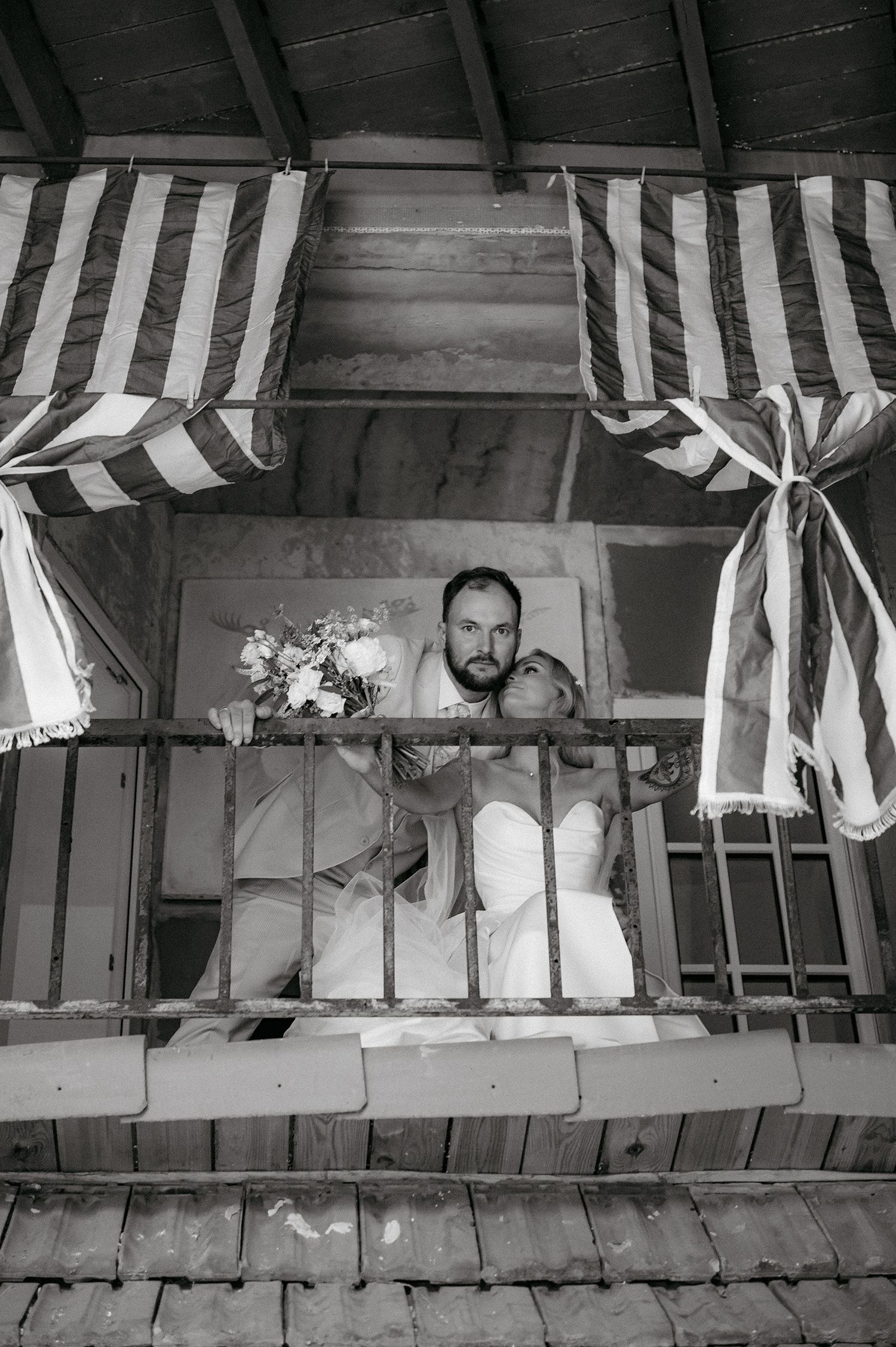 Black and white photo sequence of a striped awning and vintage window frames.