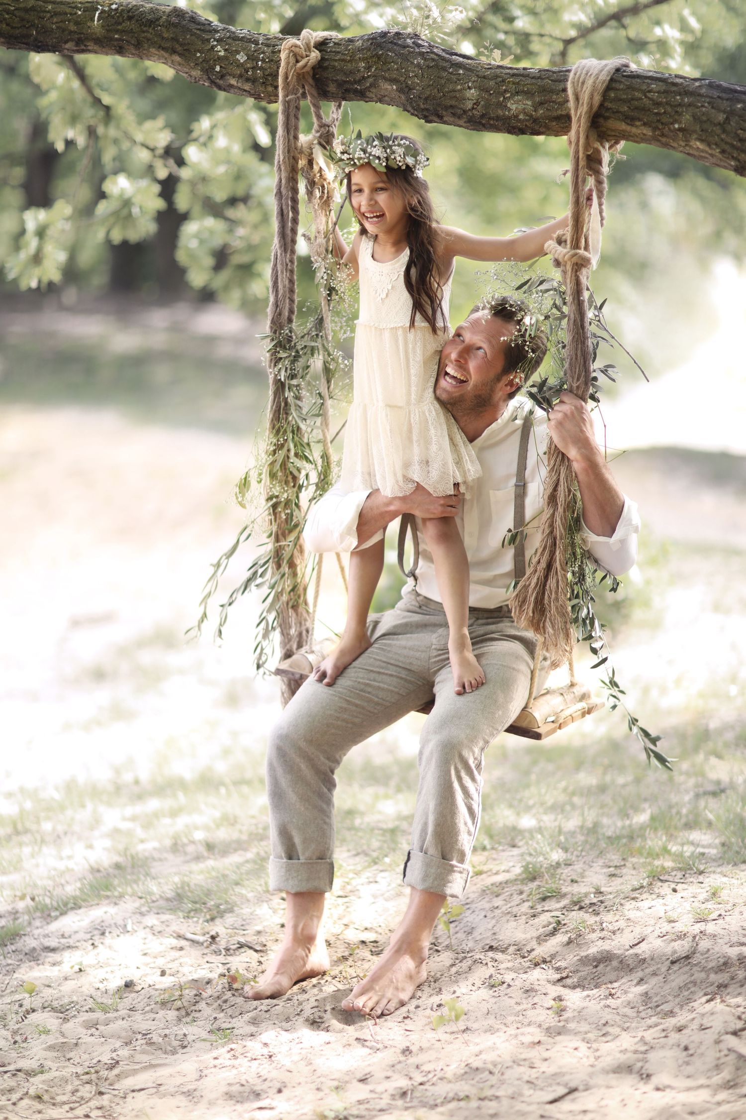 Peter Schotting with daughter on a swing, family lifestyle campaign, natural outdoor photography