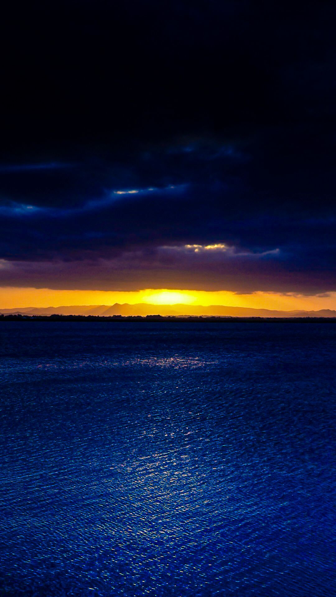 Sun setting on waterfront