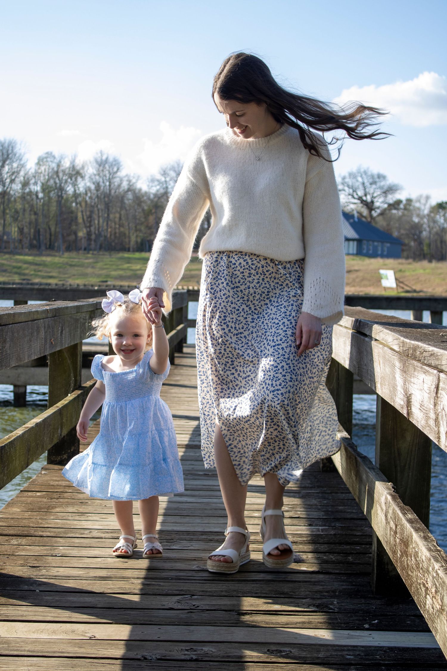 Family photographer Savannah GA, spring outfits walking wooden pier water session — The Quiet Lens Studio