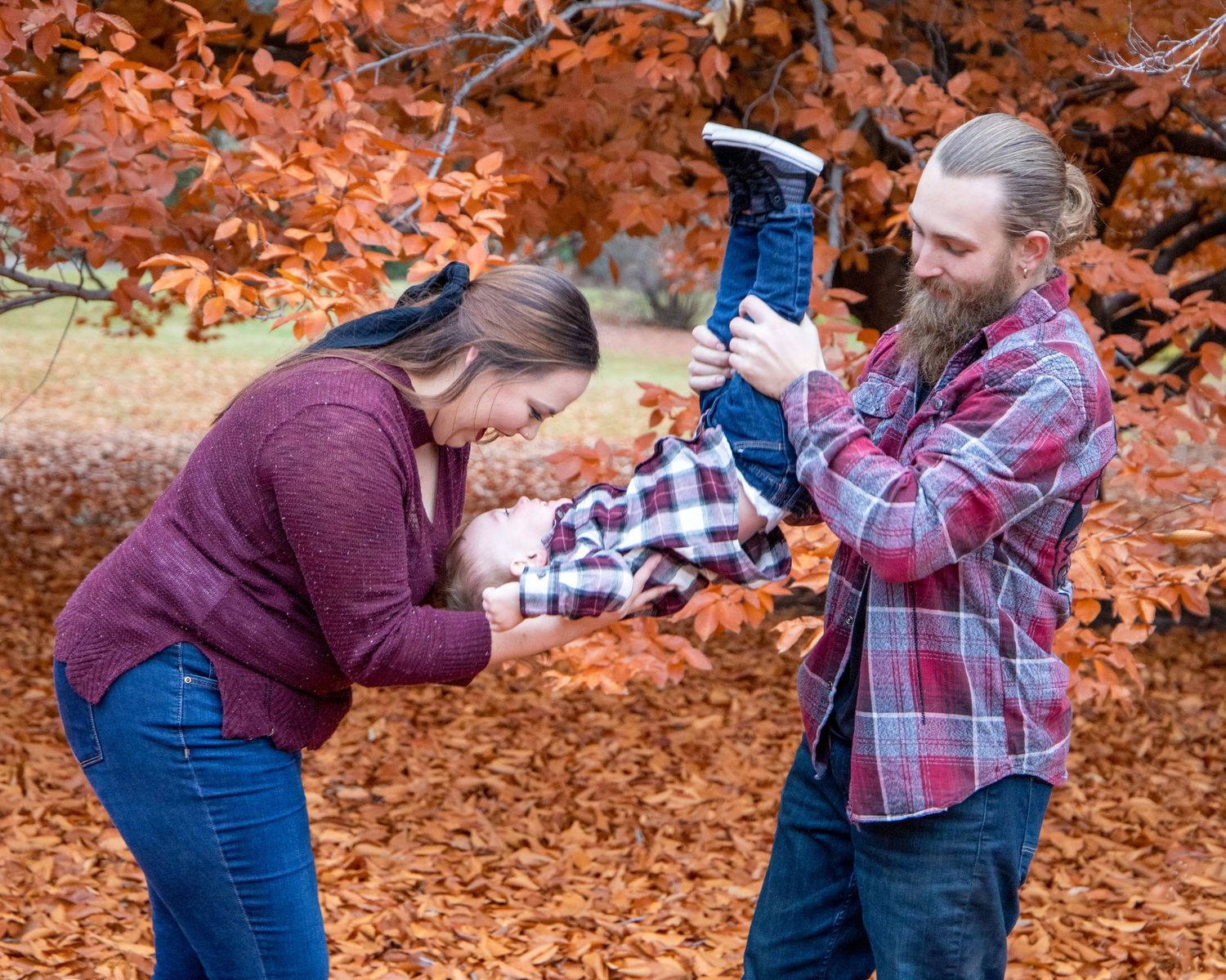 Sequence of playful moments in autumn leaves with vibrant orange colors.