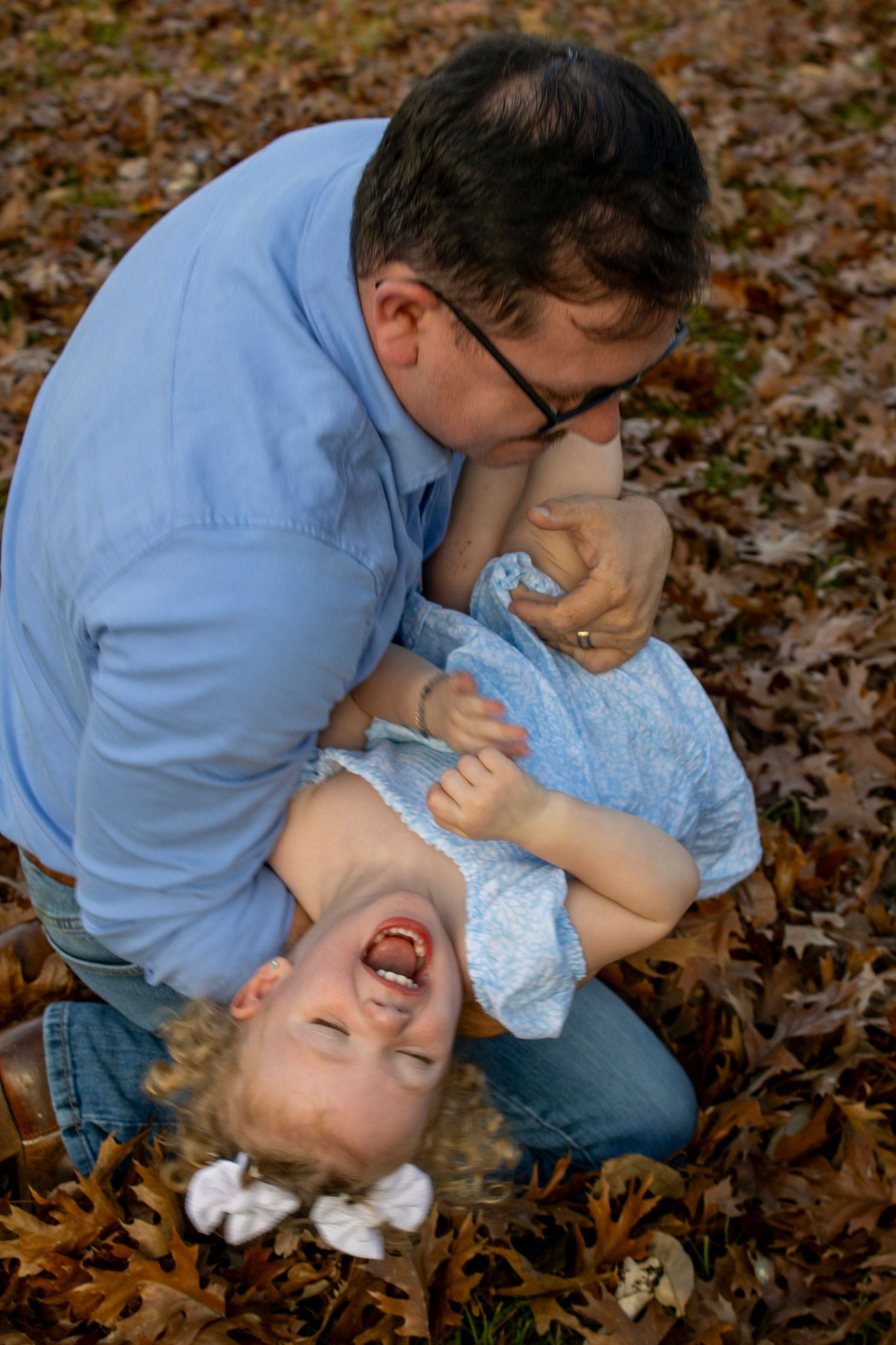 Family photographer Savannah GA, candid family playing autumn leaves Hinesville GA session — The Quiet Lens Studio