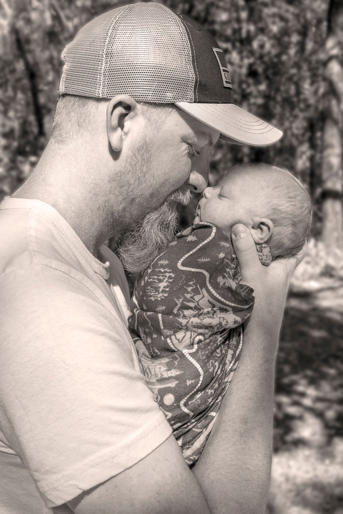 Black and white outdoor sequence showing parent and child sharing playful moments.