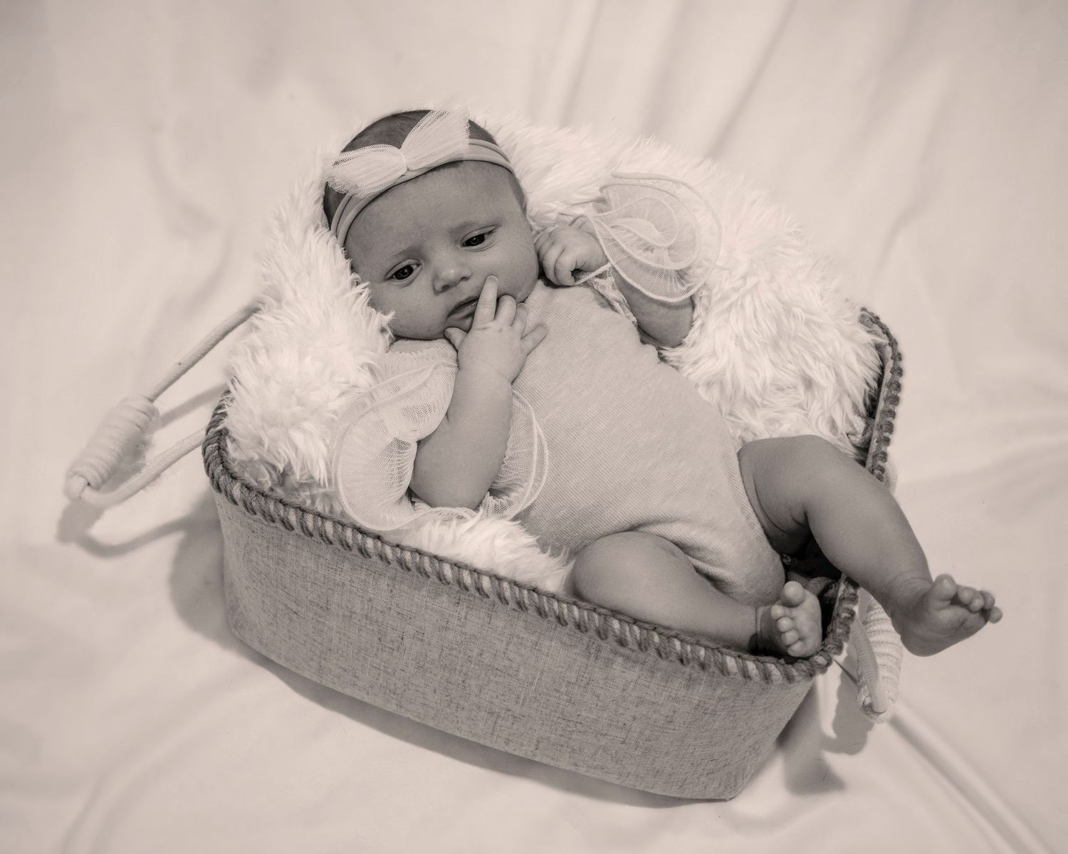 Newborn photographer Savannah GA, newborn baby sleeping basket white bedding portrait — The Quiet Lens Studio
