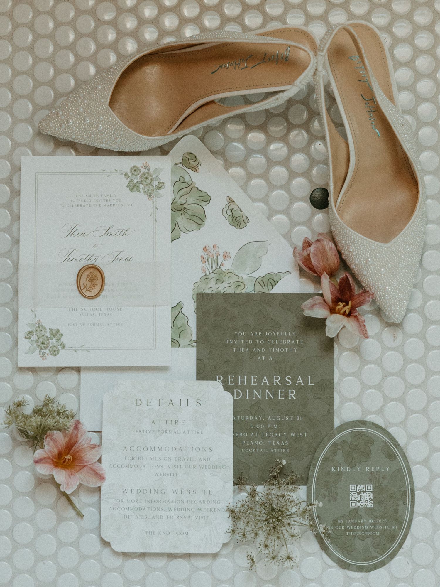 Elegant wedding stationery suite in sage green and cream with floral details and nude heels on textured background.