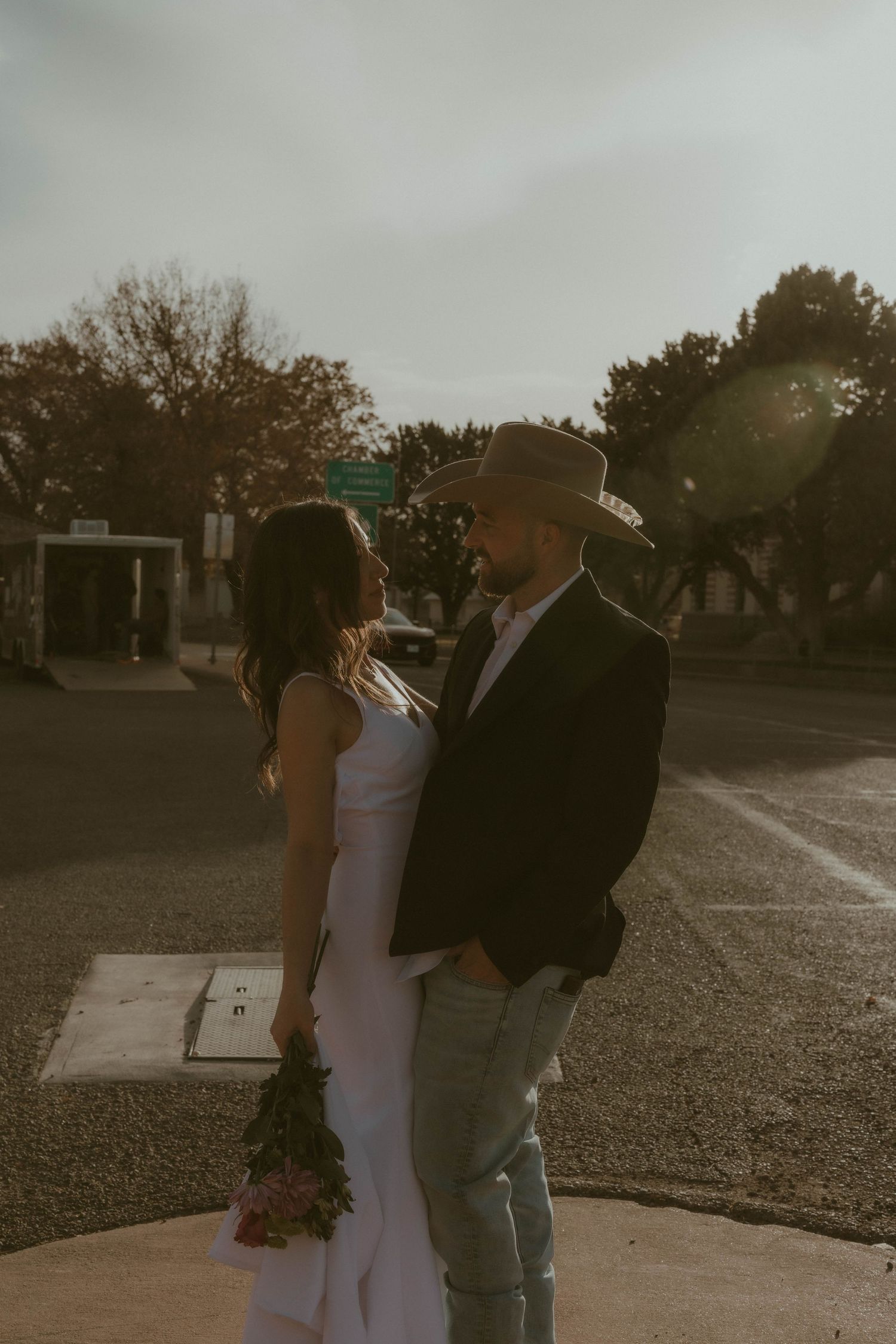 A romantic sunset photoshoot sequence showing a couple in western attire.