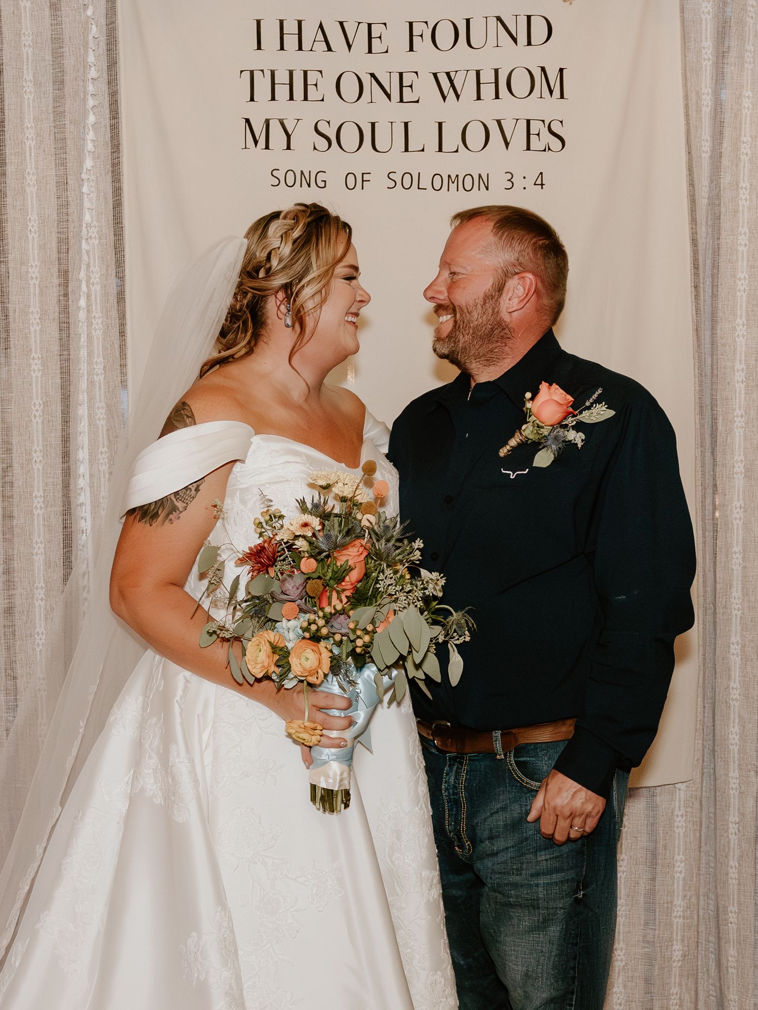 Romantic wedding portraits against backdrop with scripture verse from Song of Solomon.