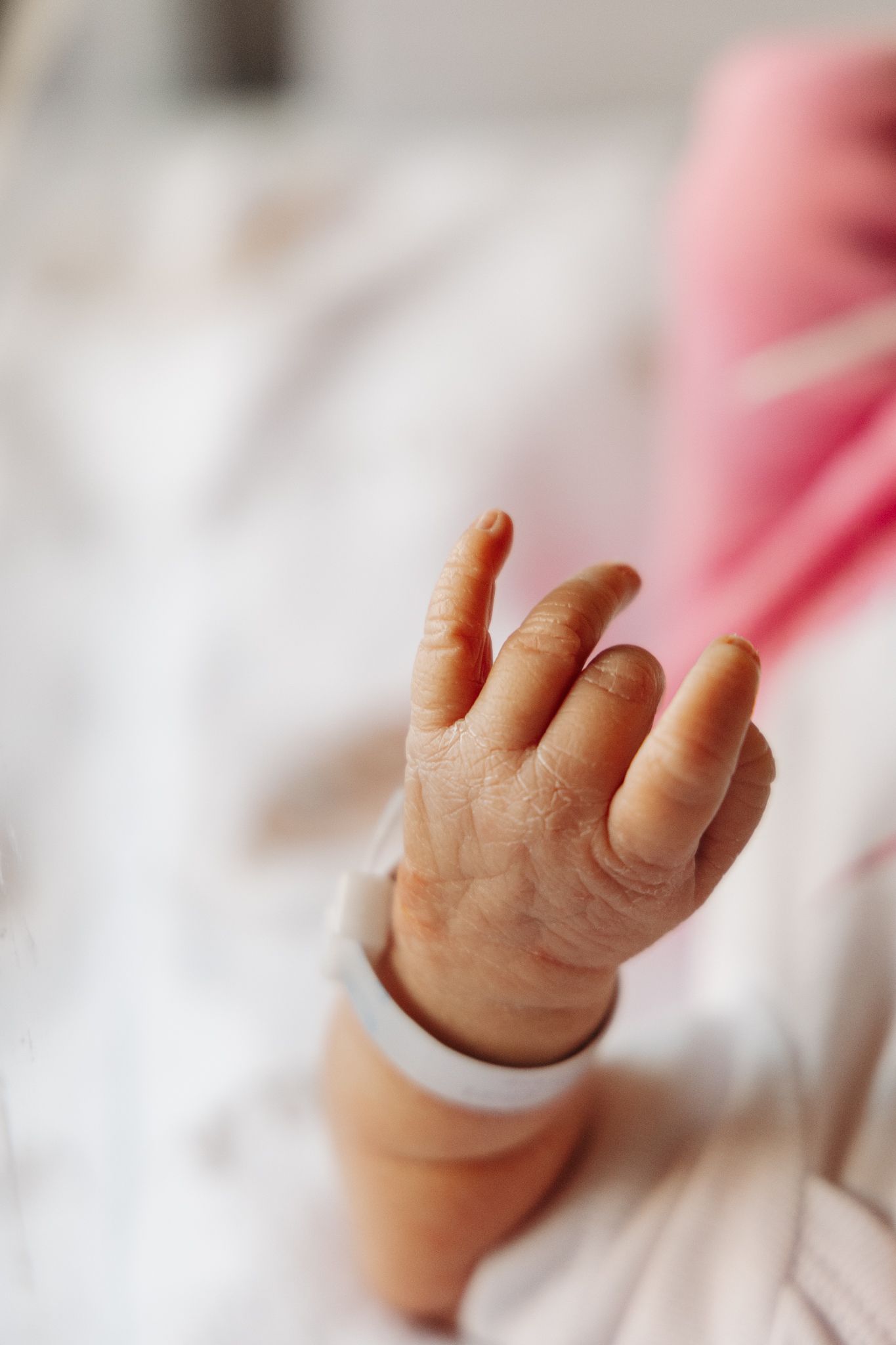 light and airy photo of a newborn hand.