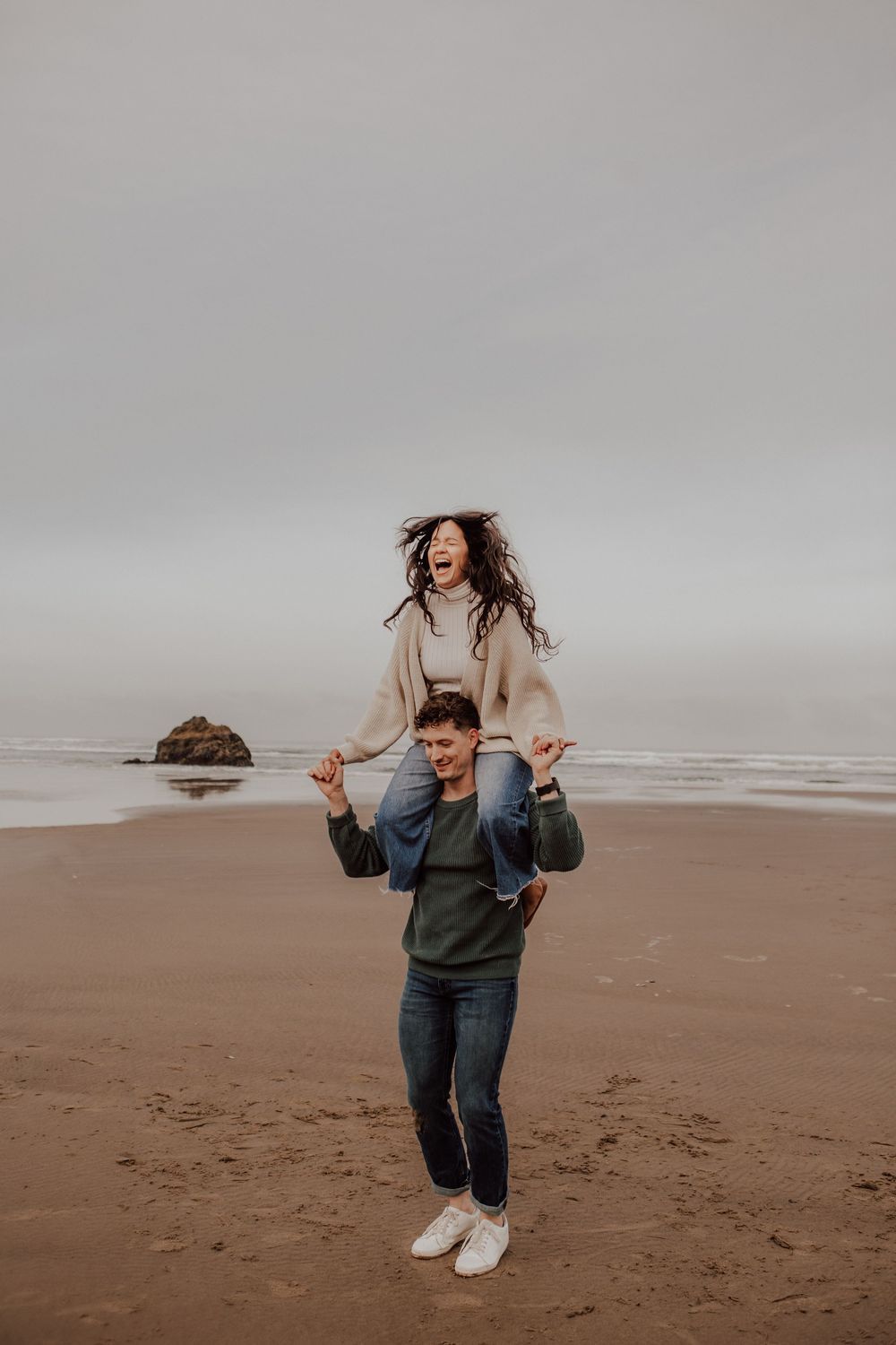 Oregon Coast couple on shoulders