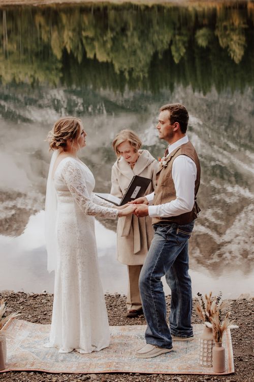 Kananaskis, Alberta elopement with reflection in pond of mountains