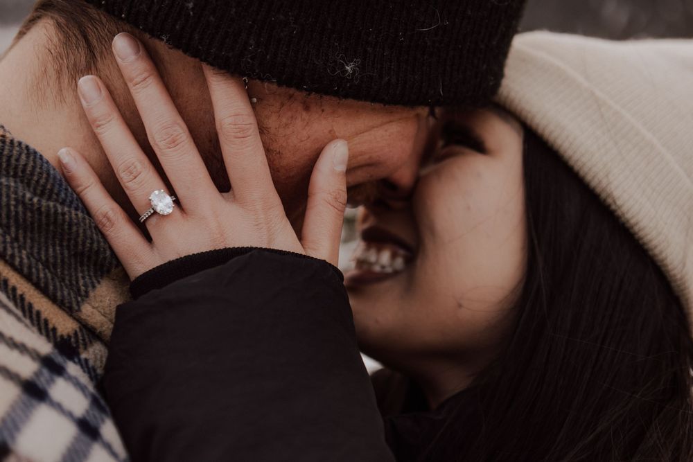 Canmore, Alberta engagement during winter with mountain background