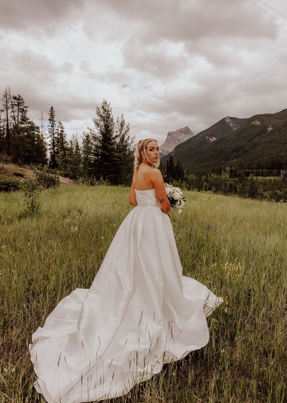 Canmore wedding bridal photos with mountain backdrop
