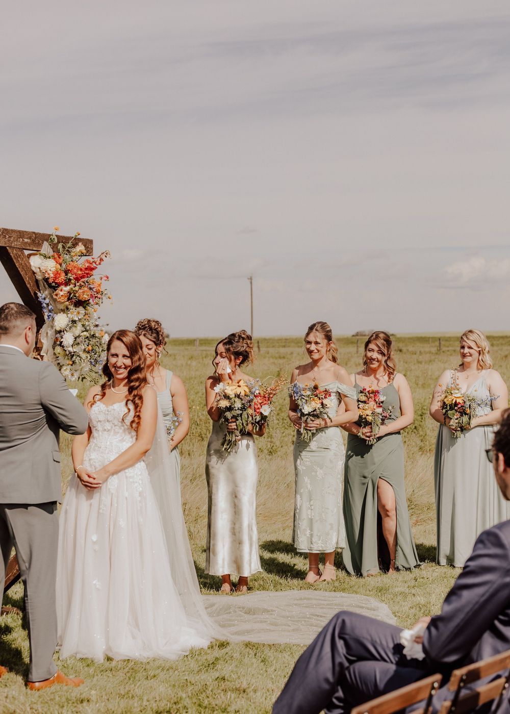 Calgary, Alberta Wedding ceremony bridesmaid and bride
