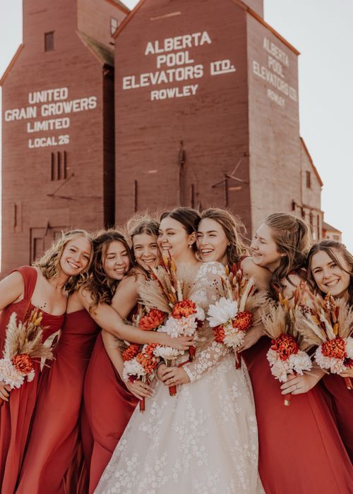 Alberta wedding bridal party hug