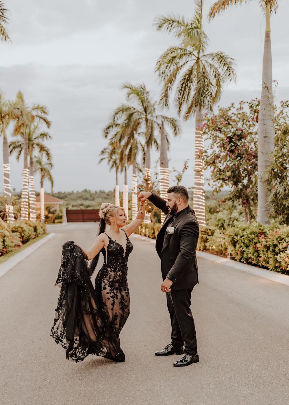 Dreams Playa Mujeres Golf & Spa Resort Wedding bride and groom with black wedding dress