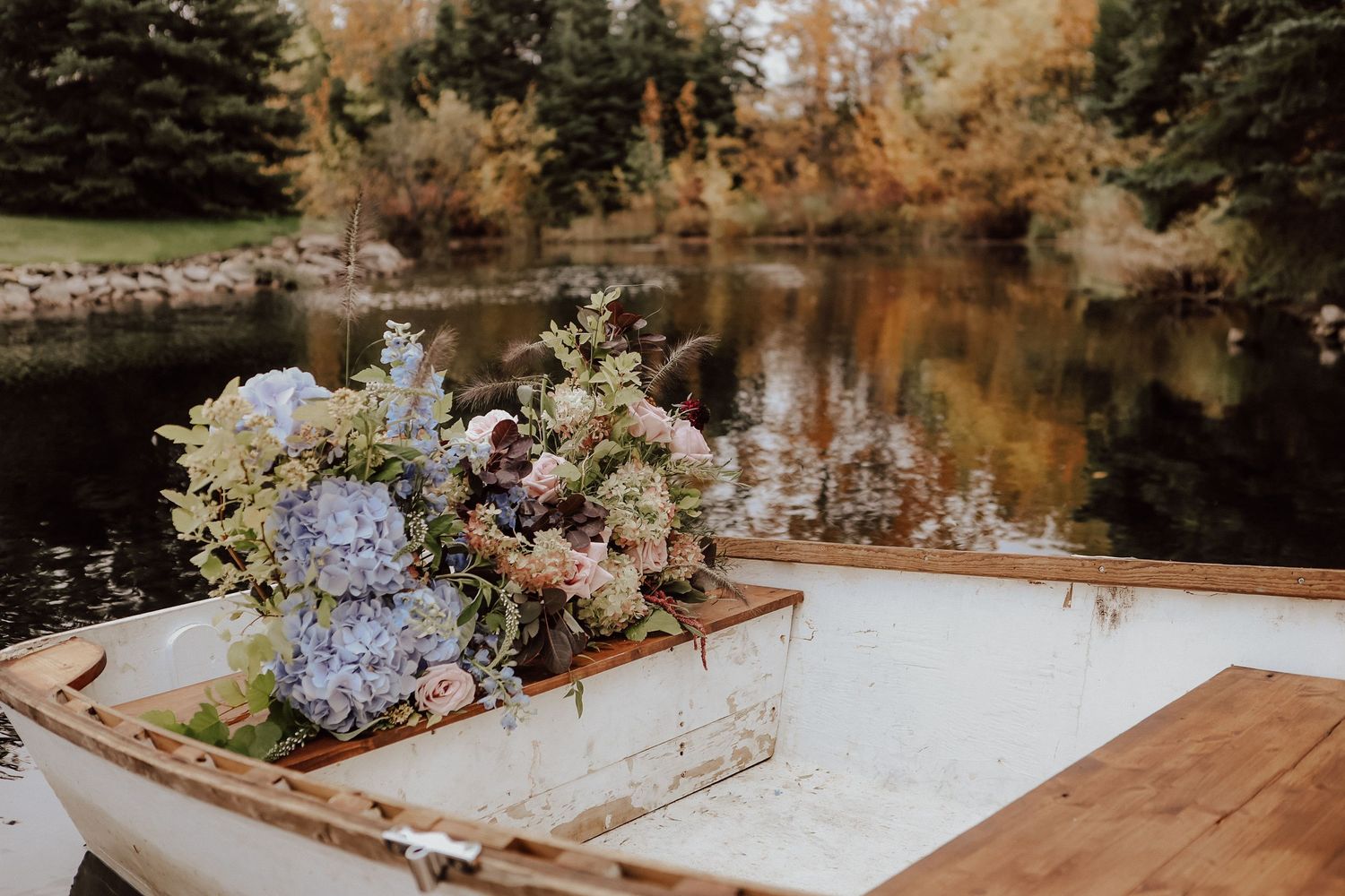 Pine and Pond wedding venue boat in Alberta