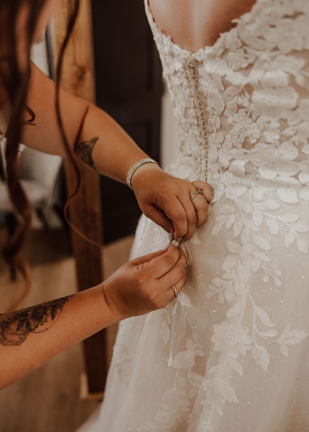 Calgary, Alberta Wedding bride getting ready with maid of honor
