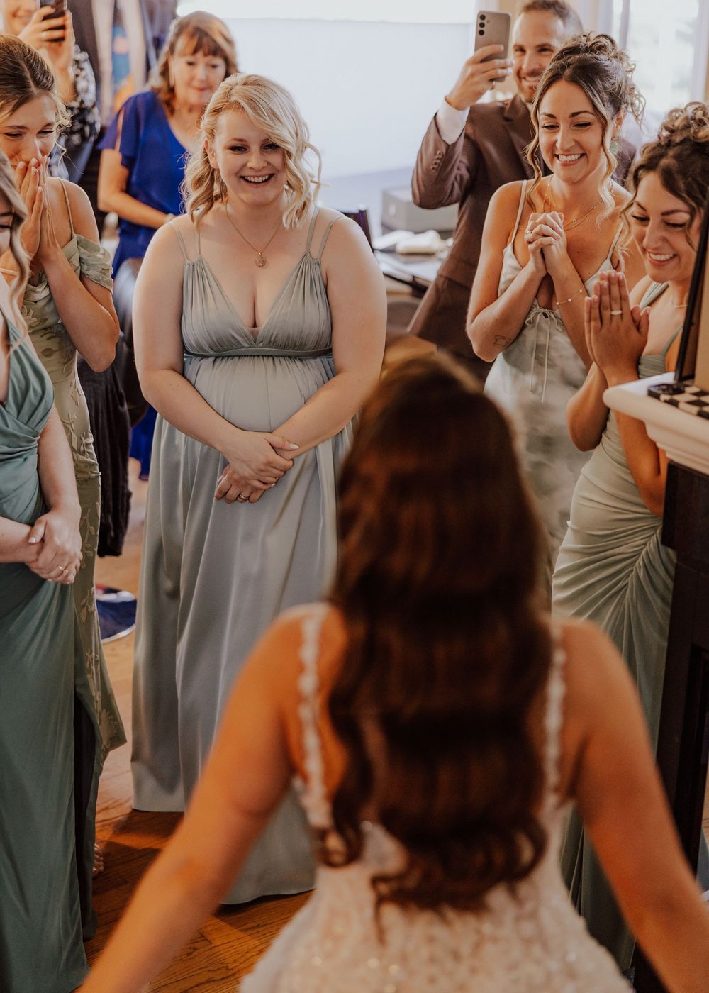 Calgary, Alberta Wedding bridesmaid first look with bride