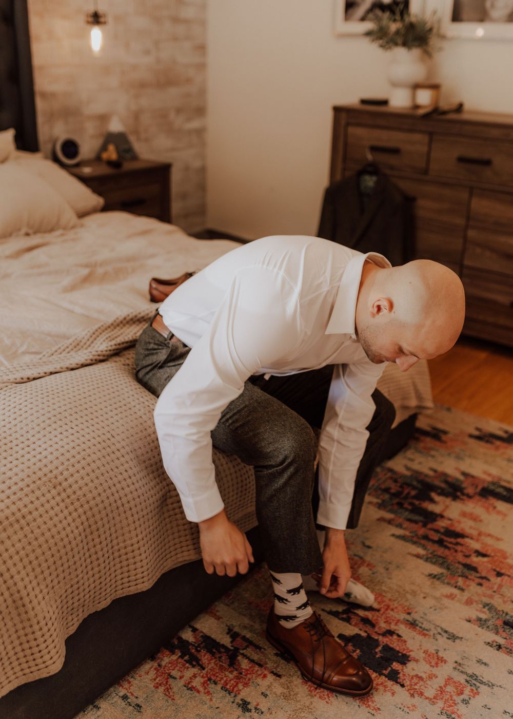 Canmore wedding photos with groom getting ready