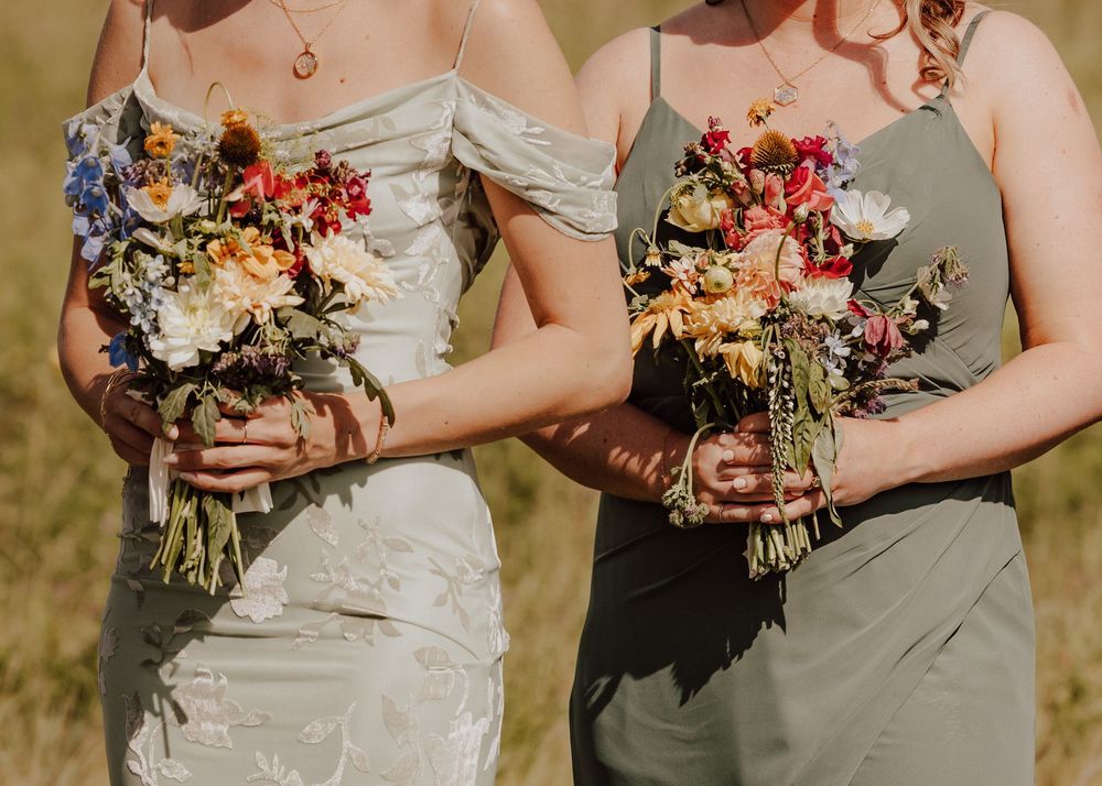 Calgary, Alberta Wedding ceremony bridesmaids flowers