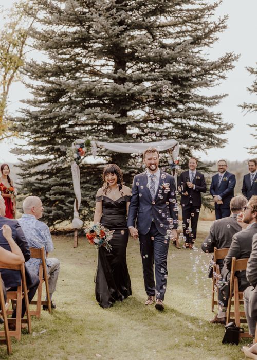 Calgary, Alberta wedding ceremony with black dress at Southern Alberta Pioneers Memorial Building