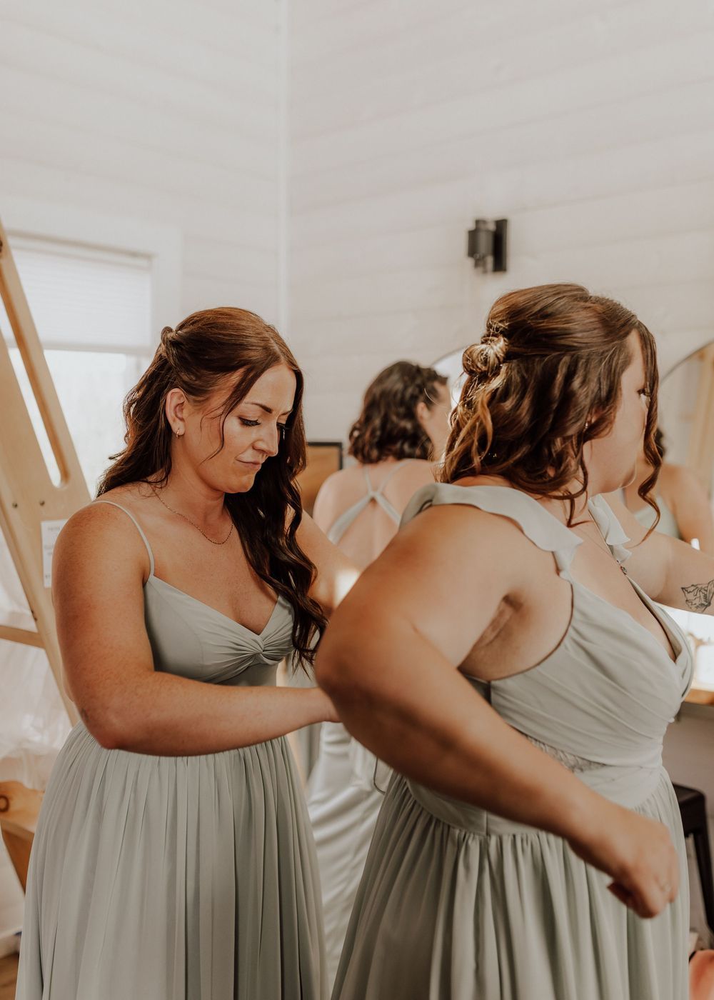 Calgary, Alberta Wedding bridesmaids getting ready together