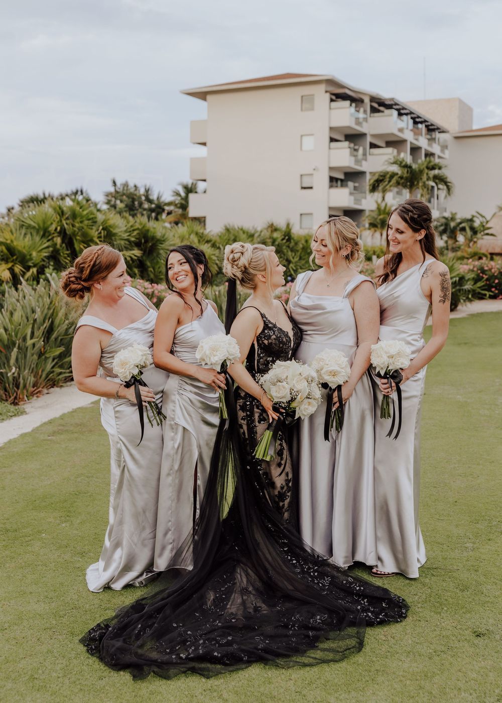 Dreams Playa Mujeres Wedding bridal party photos in grey dress and black wedding dress