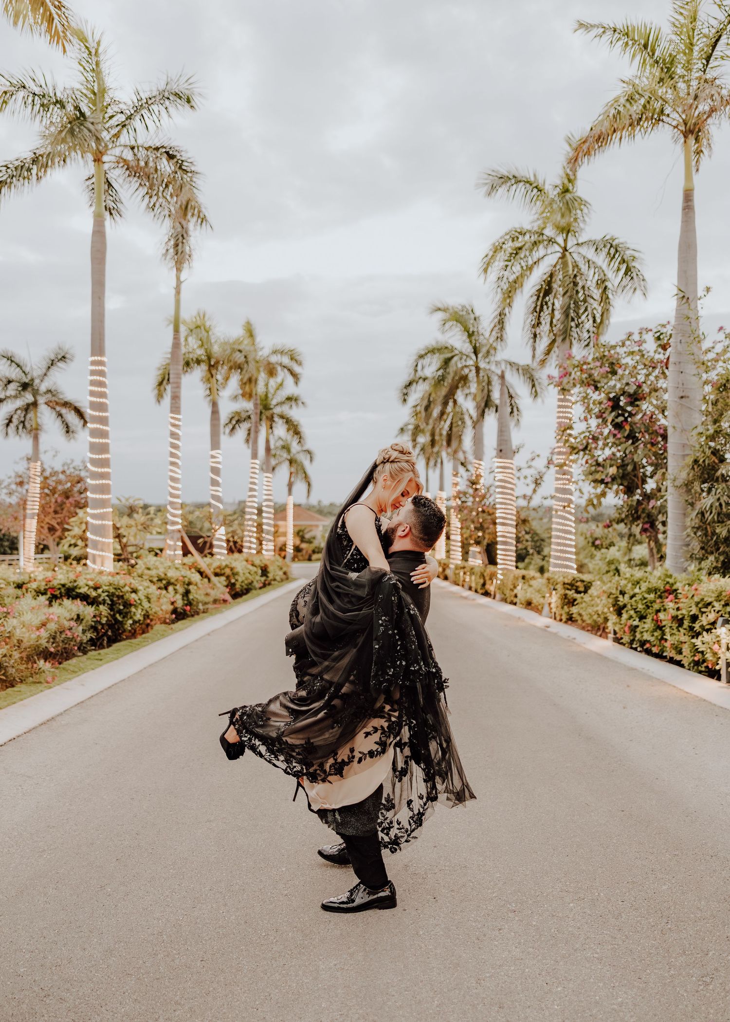 Dreams Playa Mujeres wedding with bride and groom black wedding dress