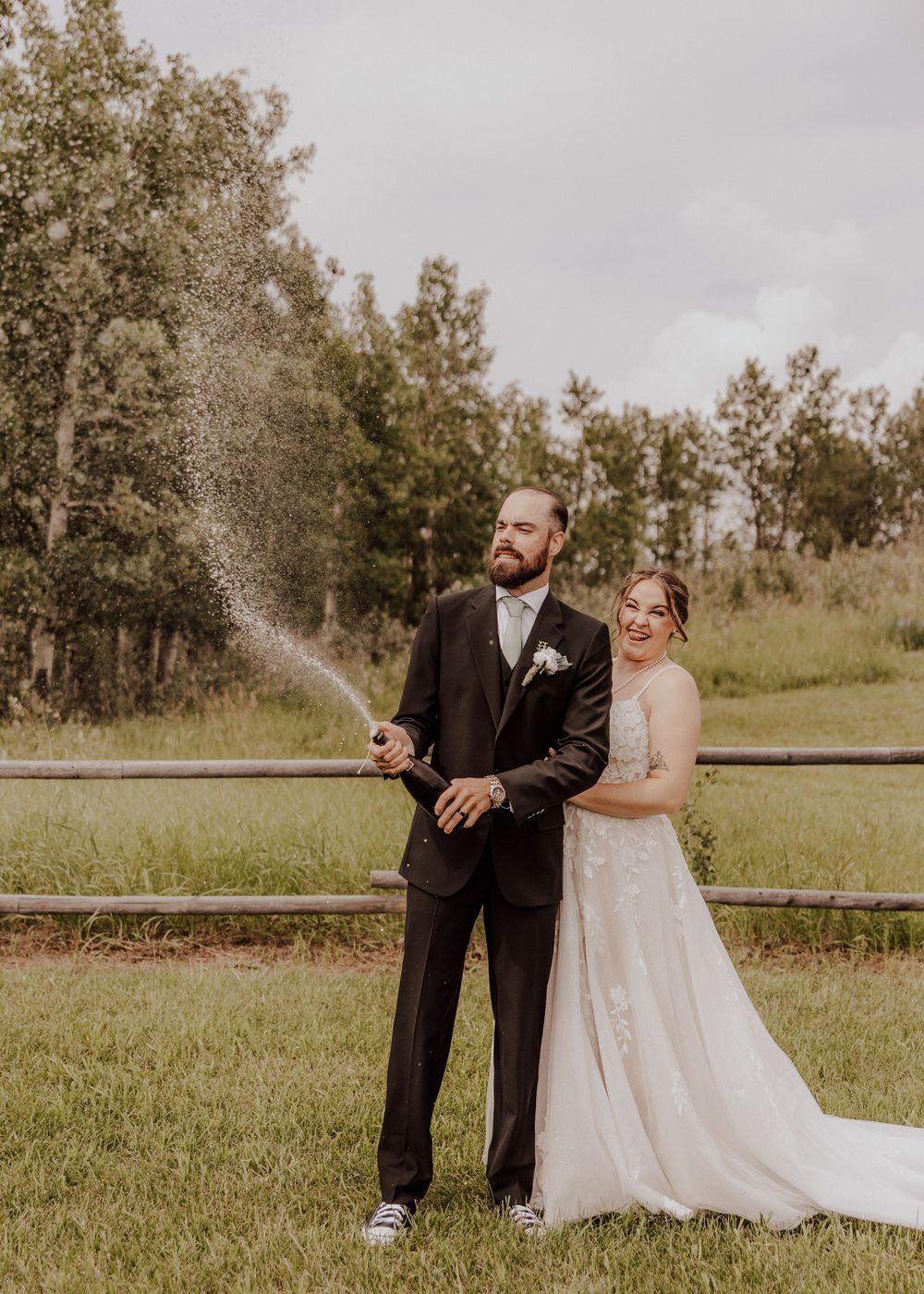 Calgary, Alberta Wedding champagne pop