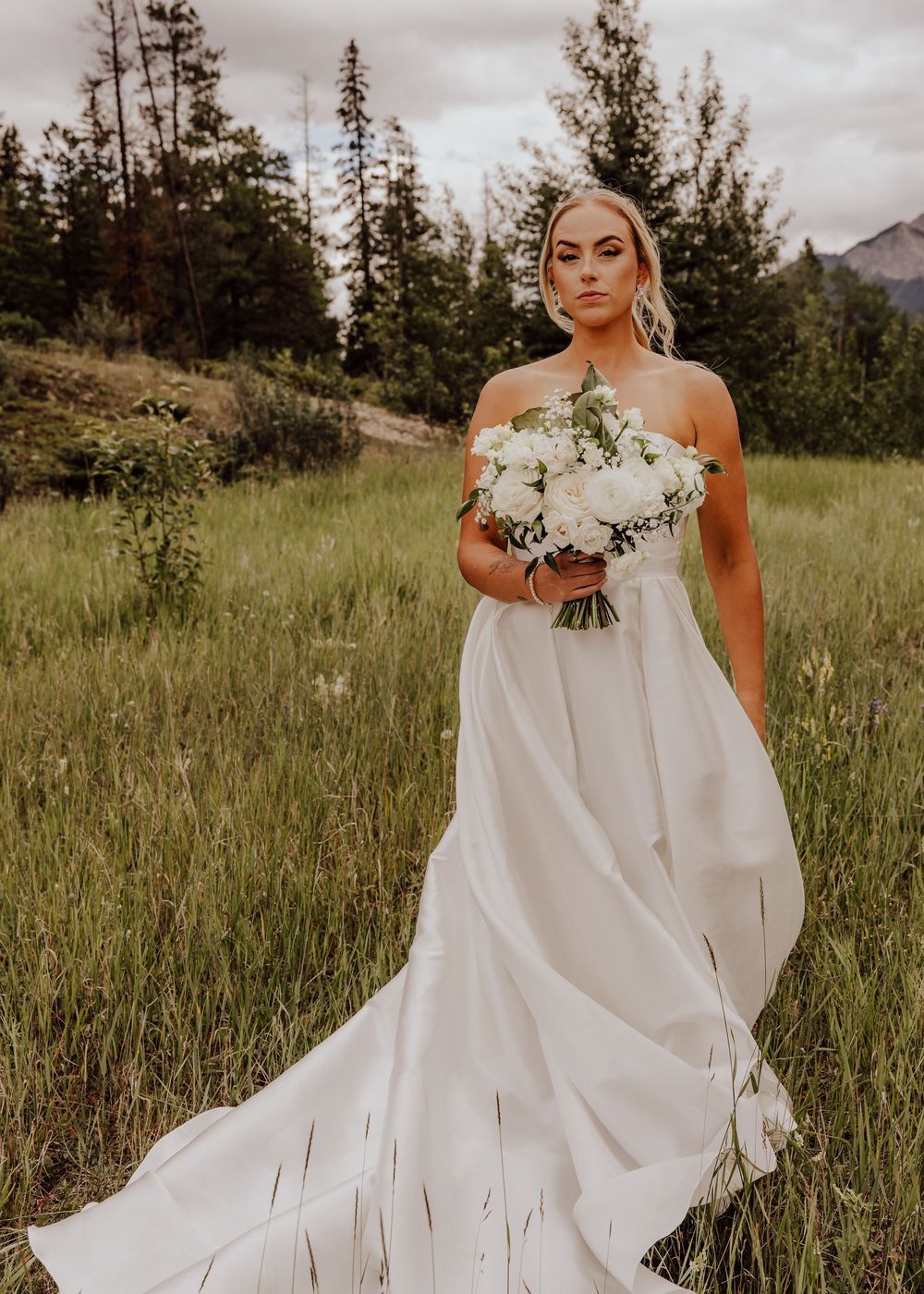 Canmore wedding bridal photos with mountain backdrop