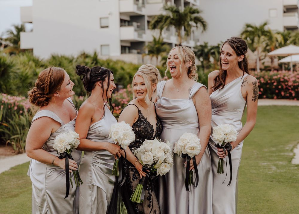 Dreams Playa Mujeres Wedding bridal party with black wedding dress