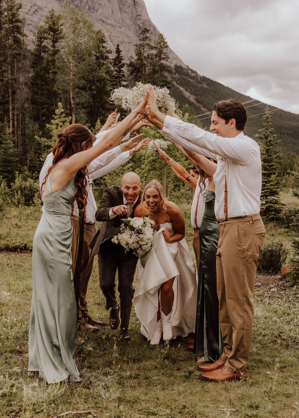 Canmore wedding photos with mountain backdrop