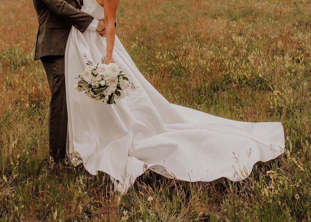 Canmore wedding photos with mountain backdrop