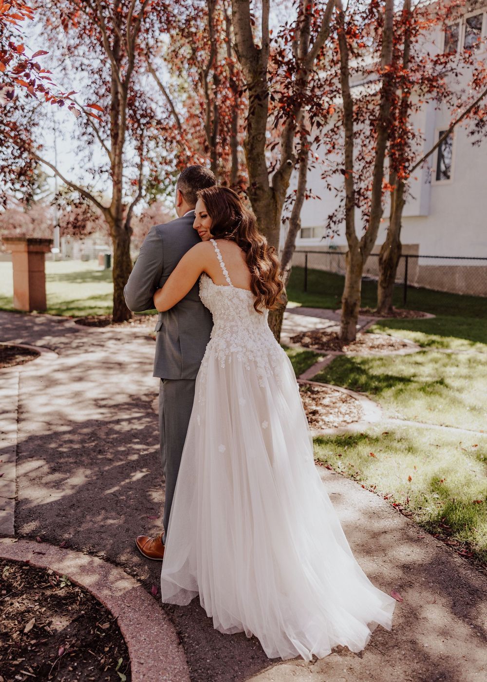 Calgary, Alberta Wedding first look in tree grove