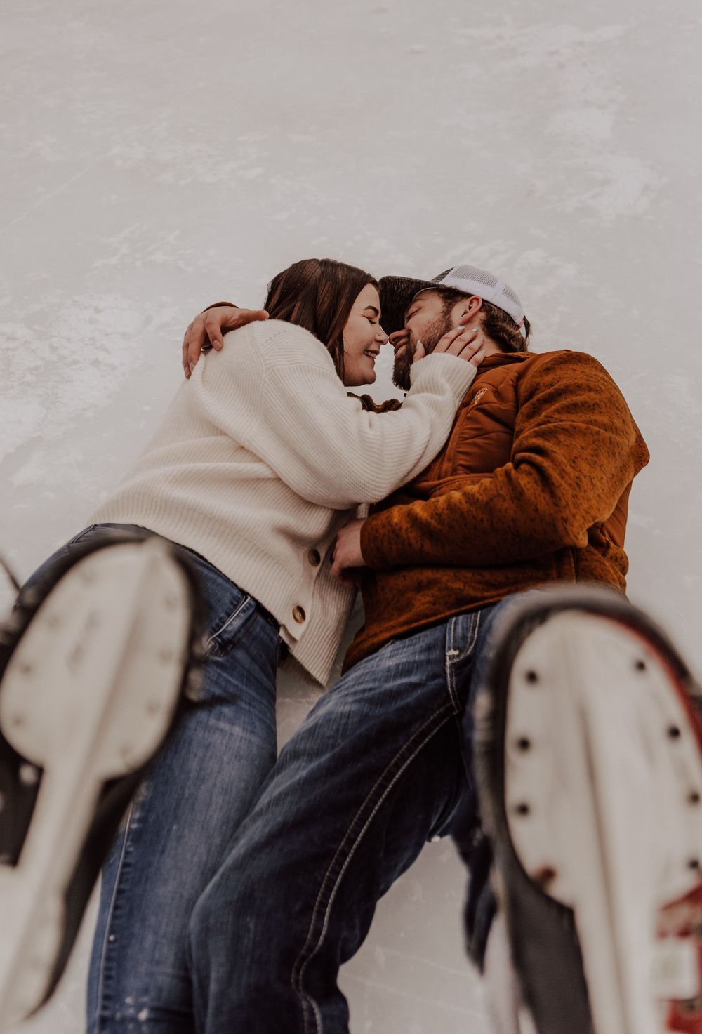 Lake Louise, Alberta engagement photos on skates