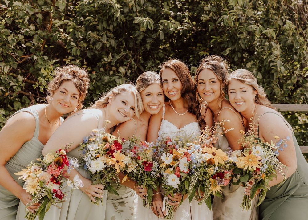 Calgary, Alberta Wedding bridal party with wildflower bouquets