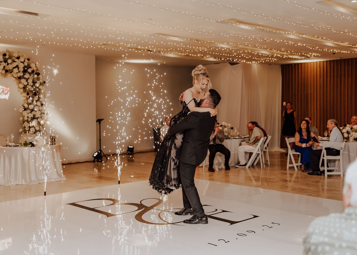 Dreams Playa Mujeres wedding first dance with a black dress and fireworks