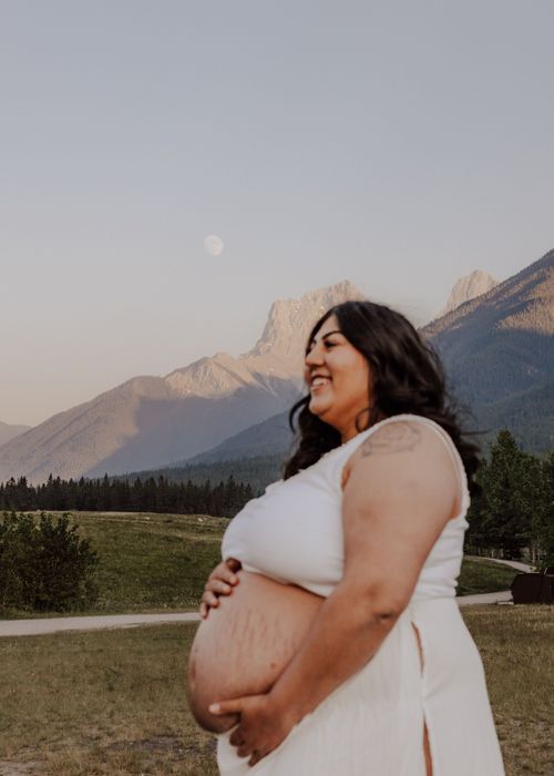 Canmore, Alberta maternity with mountain background and moon