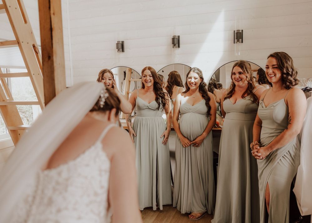 Calgary, Alberta Wedding bridesmaid first look with bride