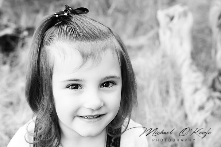 Black and white portrait series showing close-up expressions in natural lighting.