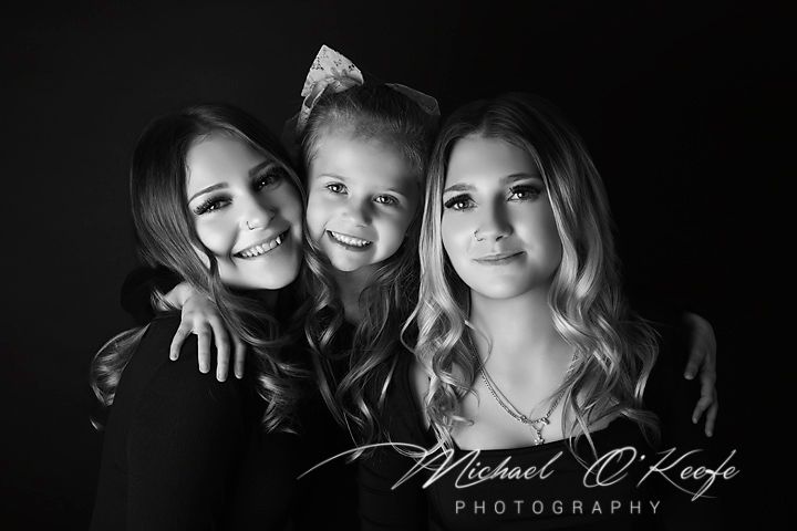 A series of six artistic black and white portraits displayed in a horizontal strip layout with dramatic lighting.