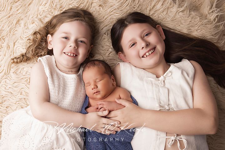 A series of heartwarming newborn photography portraits showing tender family moments on cream-colored backgrounds.
