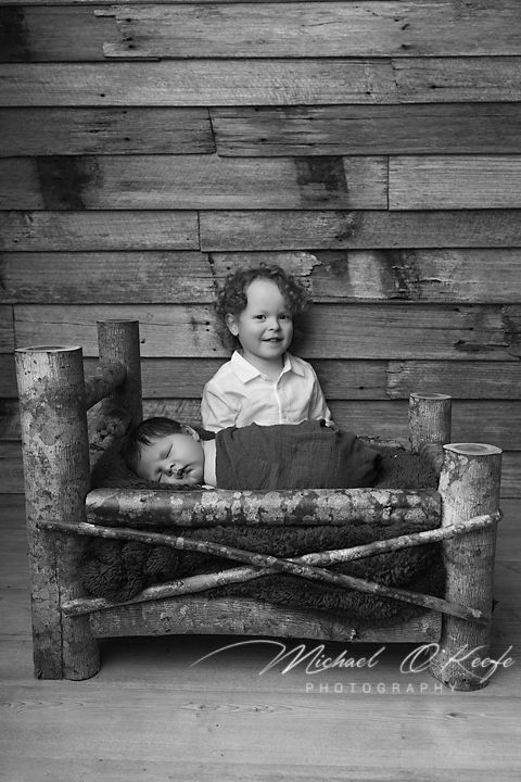 A black and white artistic photo series showing a small child resting on rustic log benches against a wooden wall.