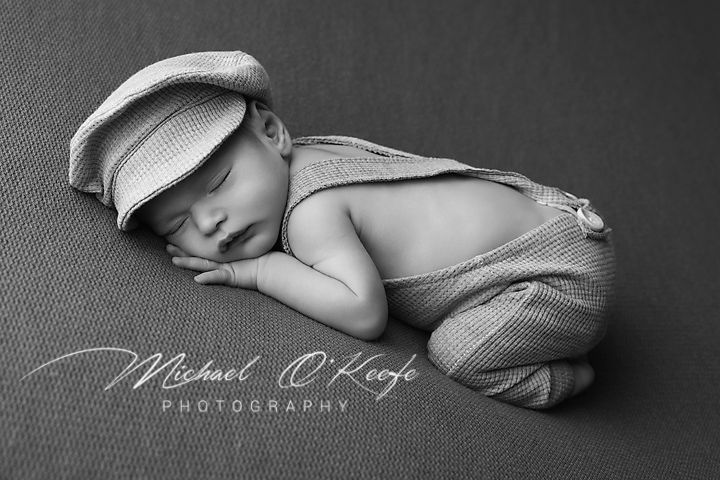 Black and white newborn photography collage showing sleeping baby in soft poses with delicate lighting.
