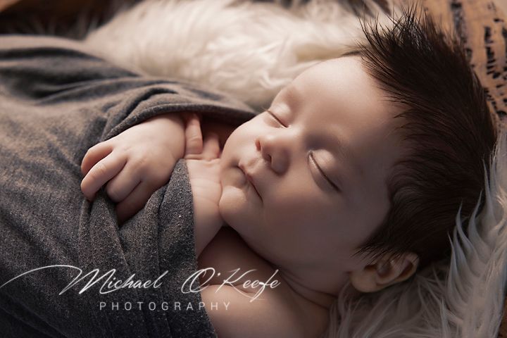 A series of black and white artistic portrait photographs showing intimate close-up details in moody lighting.