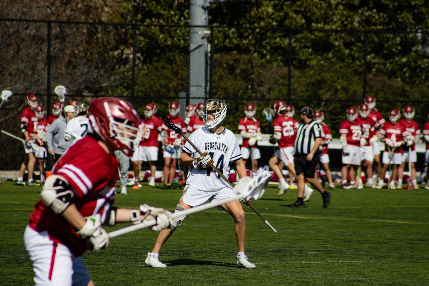 GT Lacrosse middle of action.