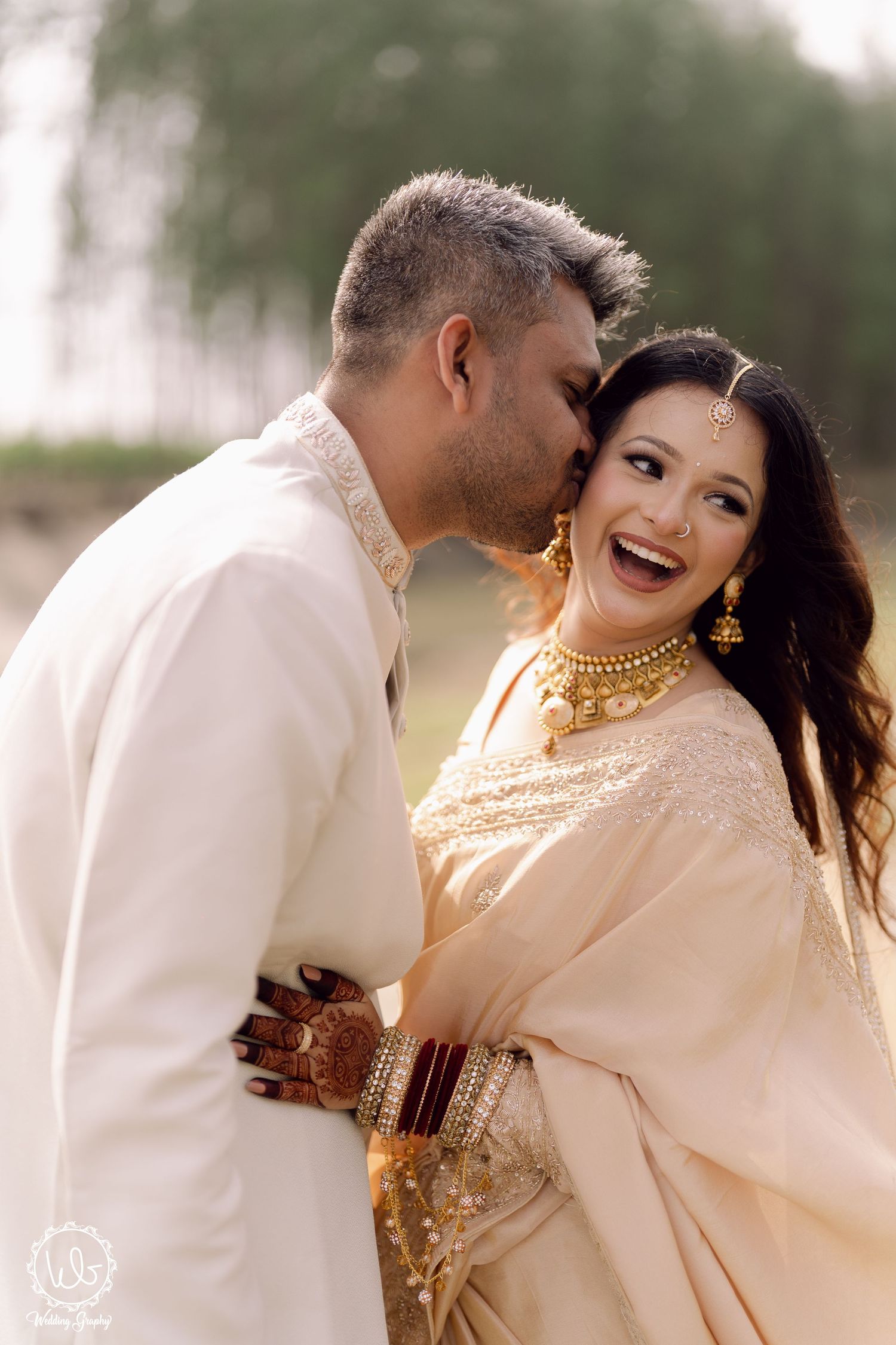 A romantic couple in matching white outfits share tender moments in a dreamy outdoor photoshoot sequence.