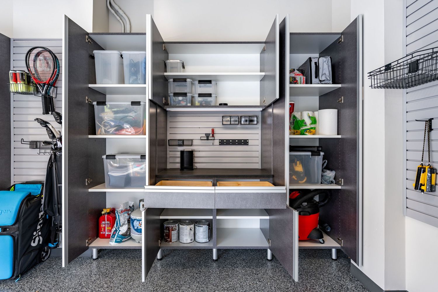 Sequence of organized garage storage cabinets and shelving units showing various angles and installation views.