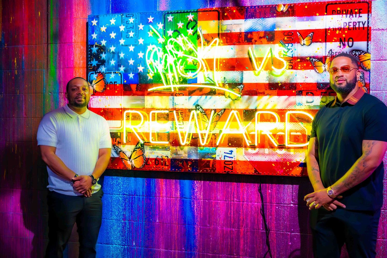 Colorful neon American flag display illuminated in vibrant red, white, and blue.